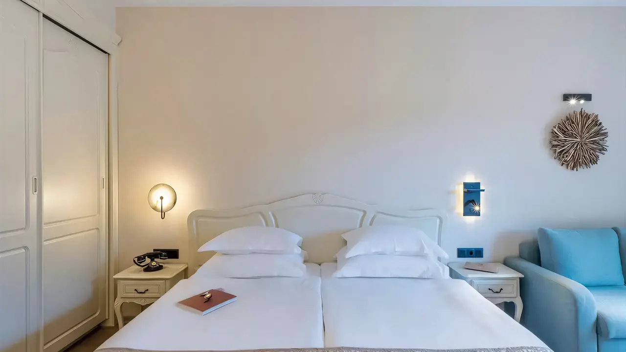 Pokój z łóżkiem w Grifid Aqua Club Bolero