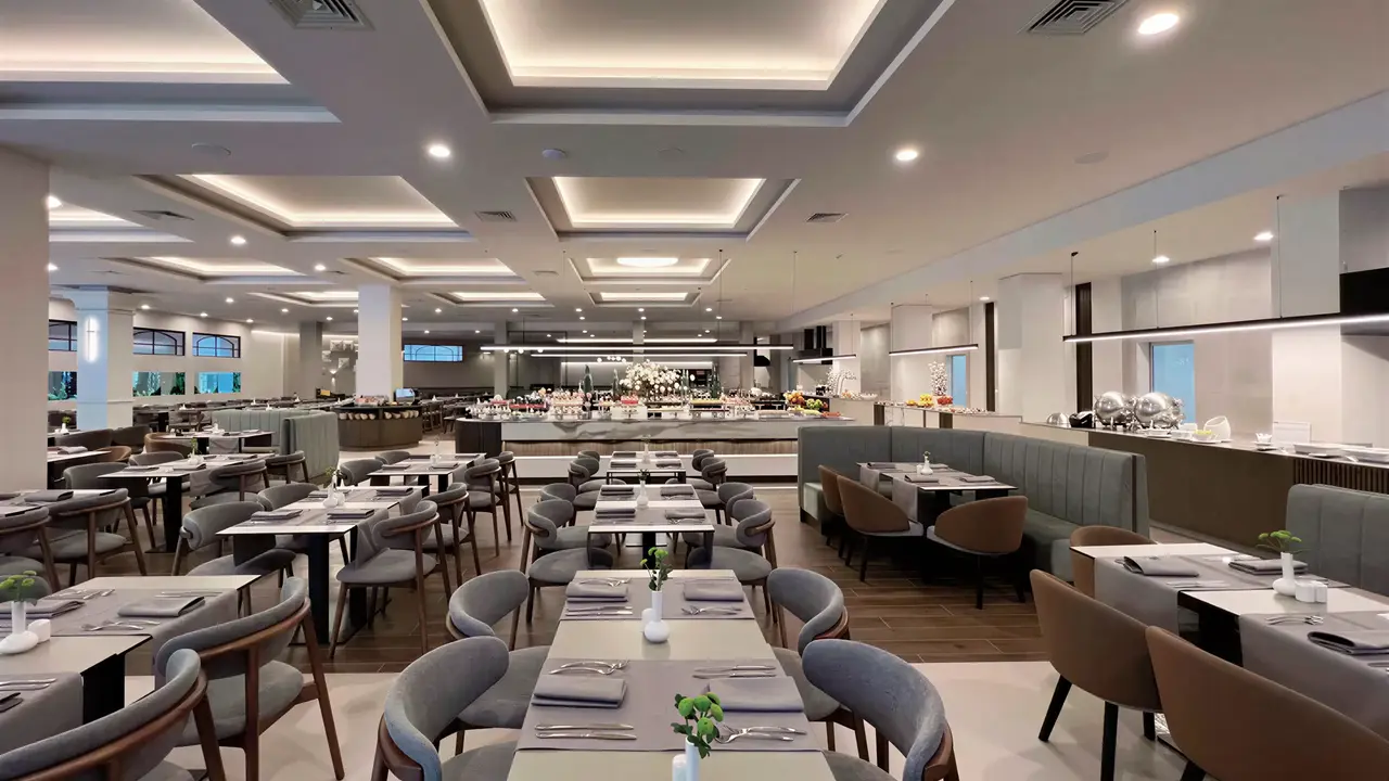 Elegancka restauracja w Grifid Aqua Club Bolero z nakrytymi stołami