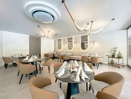Elegancka restauracja w Grifid Aqua Club Bolero z nakrytymi stołami