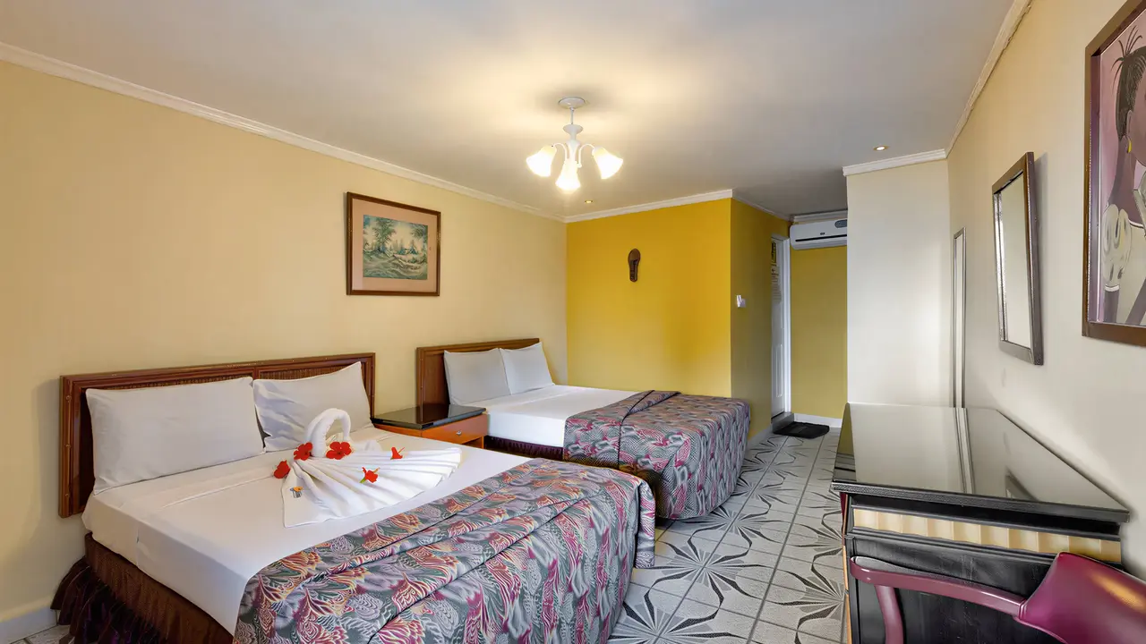 Pokój z dwoma łóżkami w Holiday Beach Club