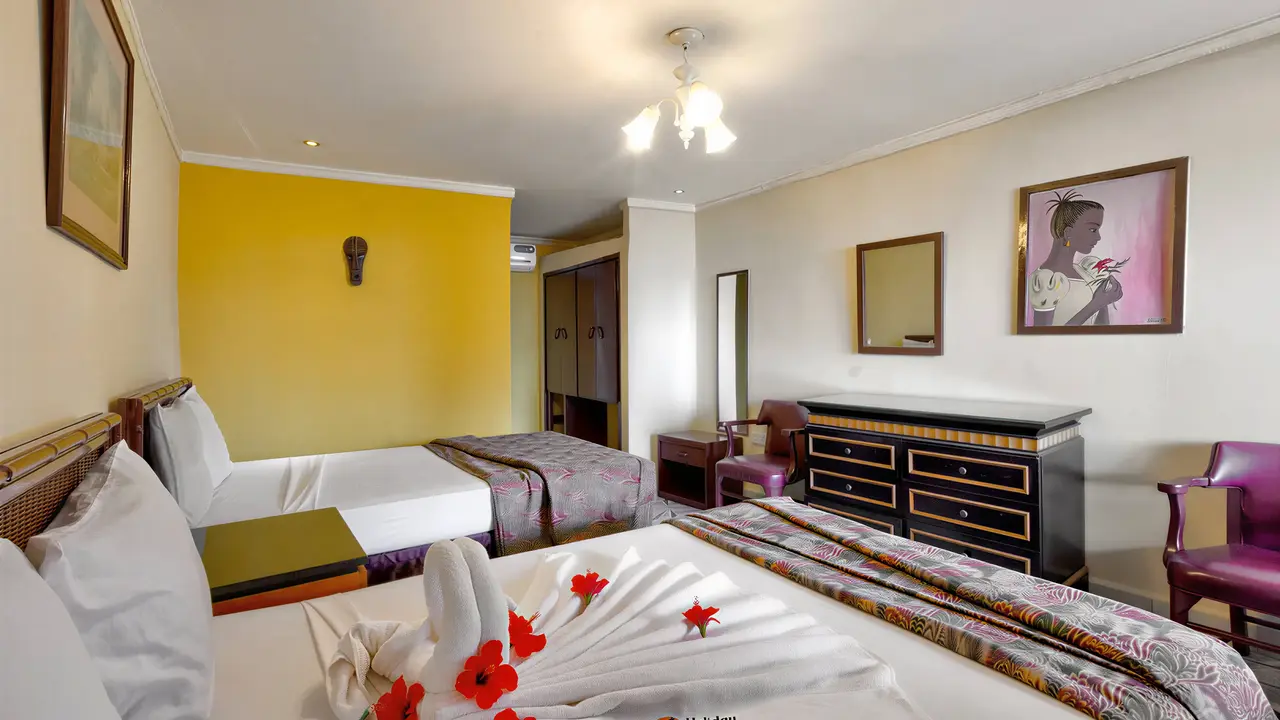 Pokój z łóżkami w hotelu Holiday Beach Club
