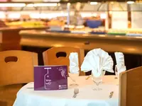 Nakryty stół w restauracji HTop Royal Star