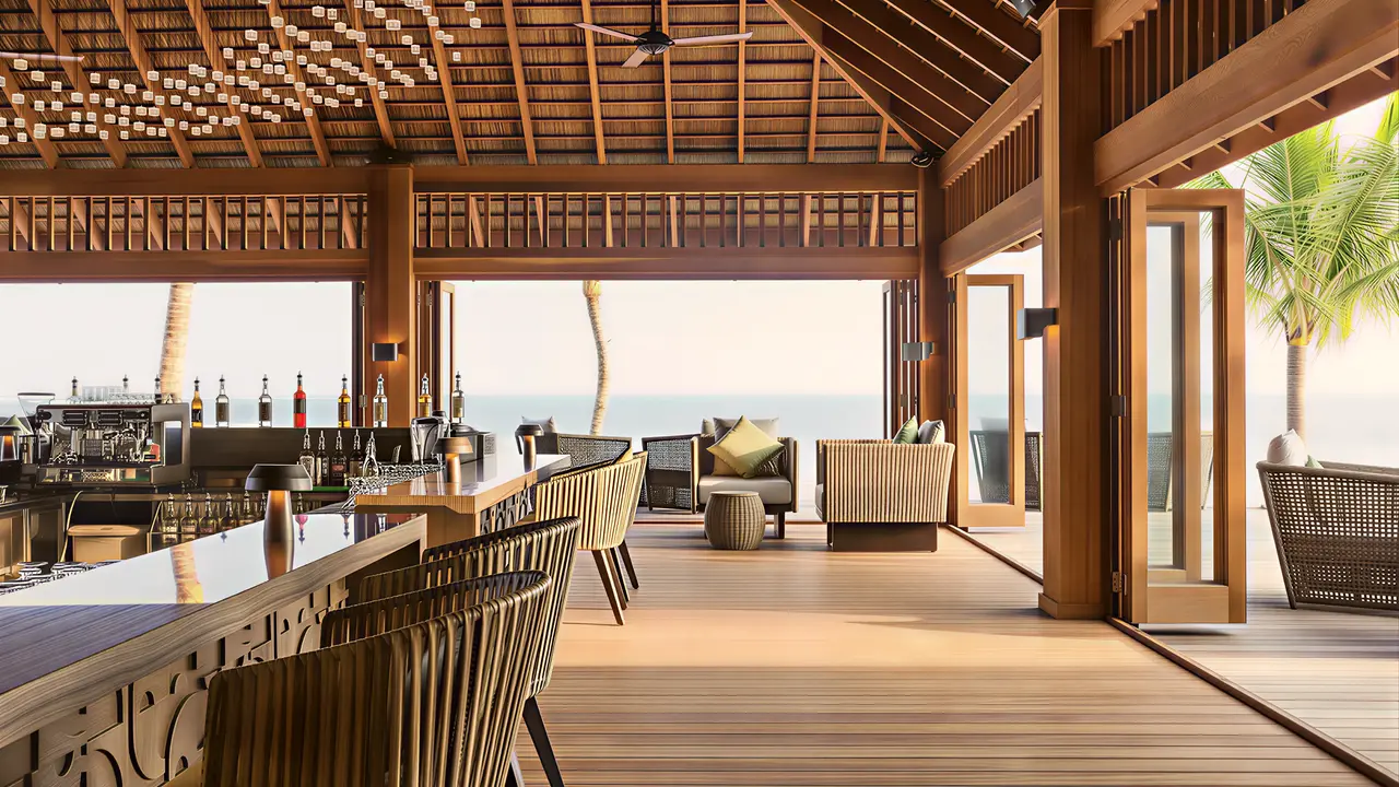 Bar z widokiem na morze w Hurawalhi Island Resort