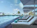 Basen z leżakami w Iberostar Lagos Algarve