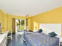Pokój z łóżkiem w hotelu Iberostar Origin Tainos