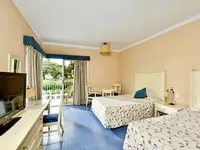 Pokój z łóżkami w hotelu Iberostar Origin Tainos