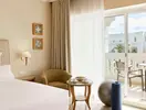 Wnętrze pokoju z balkonem w Iberostar Selection Kantaoui Bay