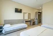 Pokój z łóżkami w hotelu Ionian Sea & Aquapark