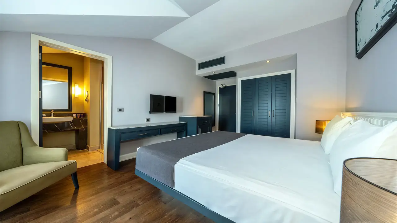 Nowoczesny pokój z łóżkiem w Jiva Beach