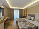 Wnętrze pokoju z łóżkami w Kahya Resort Aqua & Spa