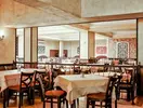 Restauracja w hotelu Kotva z nakrytymi stołami