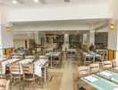 Restauracja w hotelu Kuban Resort & AquaPark z nakrytymi stołami