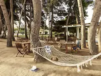 Strefa relaksu z hamakami w La Conchiglia Suites & Spa