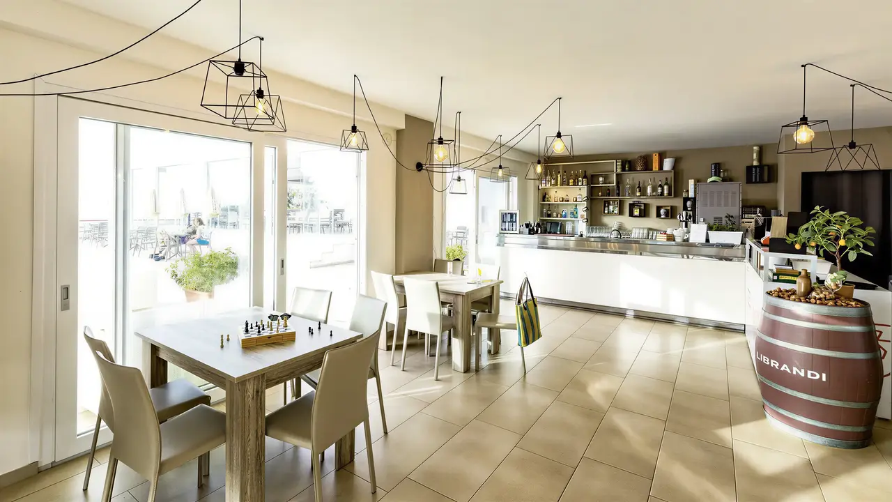Jadalnia i bufet w La Conchiglia Suites & Spa