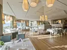 Elegancka restauracja w Liberty Lykia Adults Only z nakrytym stołami