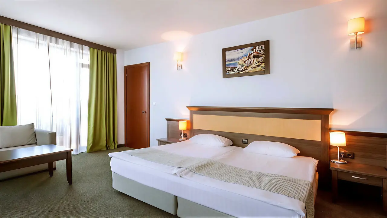 Przytulna sypialnia w hotelu Lion