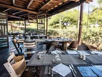 Restauracja w Lopesan Baobab Resort z nakrytymi stołami