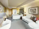 Nowoczesny pokój z łóżkiem i sofą w Lopesan Baobab Resort