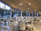 Elegancka restauracja w Lykia World Antalya & Links Golf z nakrytym stołami