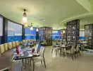 Restauracja w Lykia World Antalya & Links Golf z ustawionymi stolikami