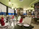 Elegancka restauracja w Lykia World Antalya & Links Golf z nakrytym stołem