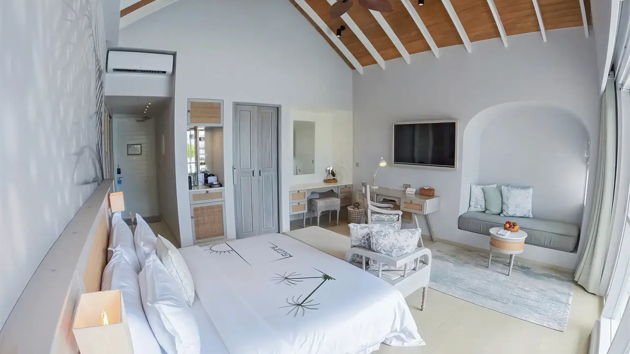 Nowoczesna sypialnia w hotelu Malahini Kuda Bandos
