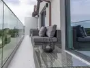 Prywatny balkon z meblami w Mazuria