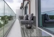 Prywatny balkon z meblami w Mazuria
