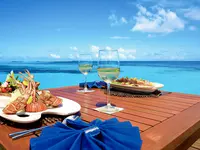 Kolacja przy plaży w Medhufushi Island Resort
