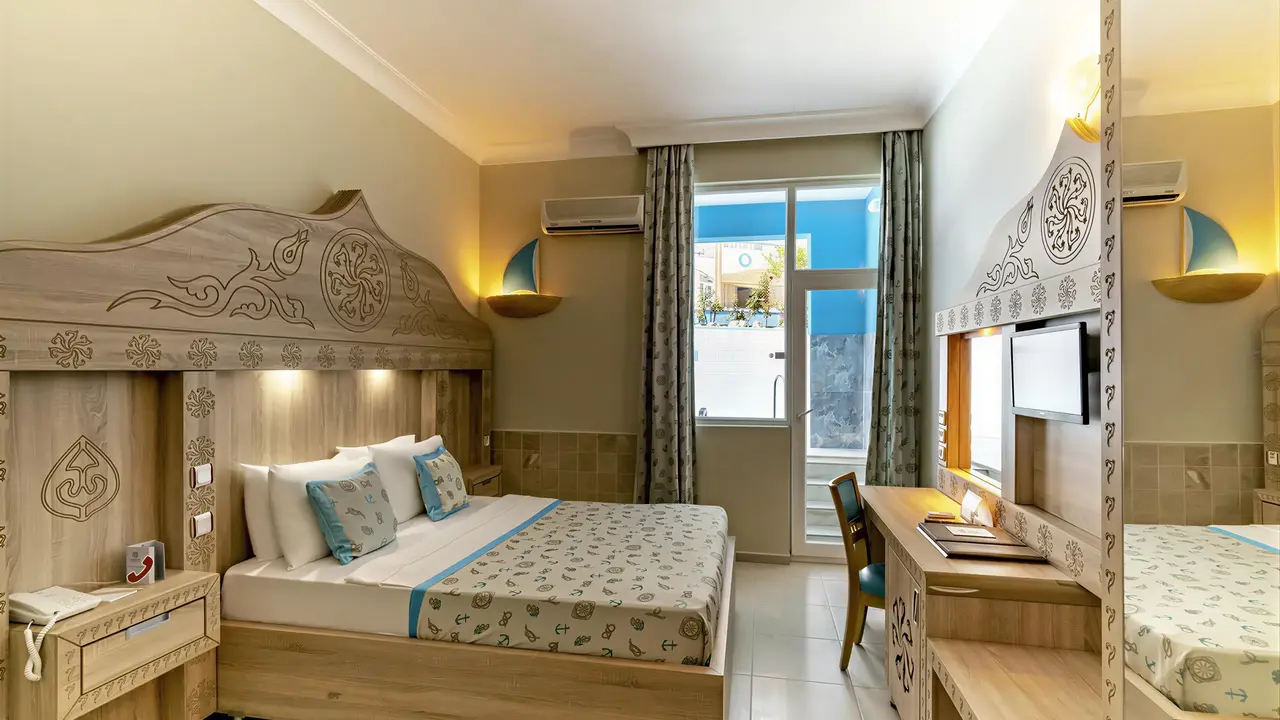 Pokój z łóżkiem w hotelu Miarosa Kemer Beach
