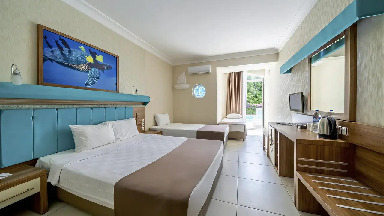 Nowoczesny pokój z łóżkami w Miarosa Kemer Beach