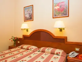 Sypialnia z łóżkami w Monopol (Puerto de la Cruz)