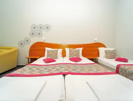 Pokój z łóżkami w MPM Kalina Garden
