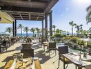 Restauracja na tarasie w Olympic Lagoon Resort Paphos