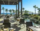 Restauracja na świeżym powietrzu w Olympic Lagoon Resort Paphos