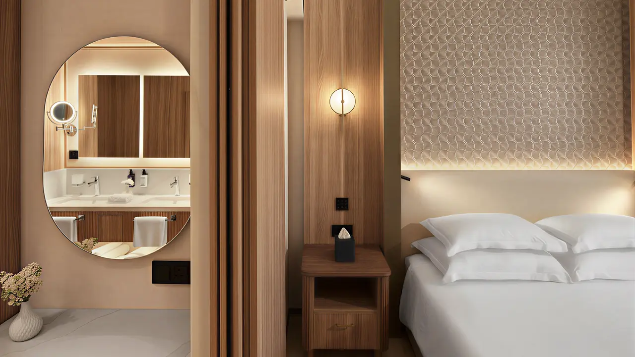 Nowoczesny pokój z łóżkiem w Olympic Lagoon Resort Paphos