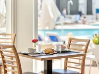 Nakryty stolik w restauracji Palia Sa Coma Playa