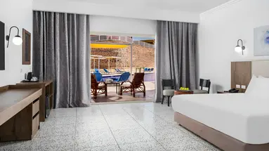 Wnętrze pokoju gościnnego w Pickalbatros Vita Resort Portofino