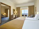Pokój hotelowy z łóżkiem w Porto Santa Maria