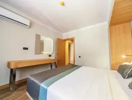 Pokój z łóżkiem w Premier Nergis Beach & SPA
