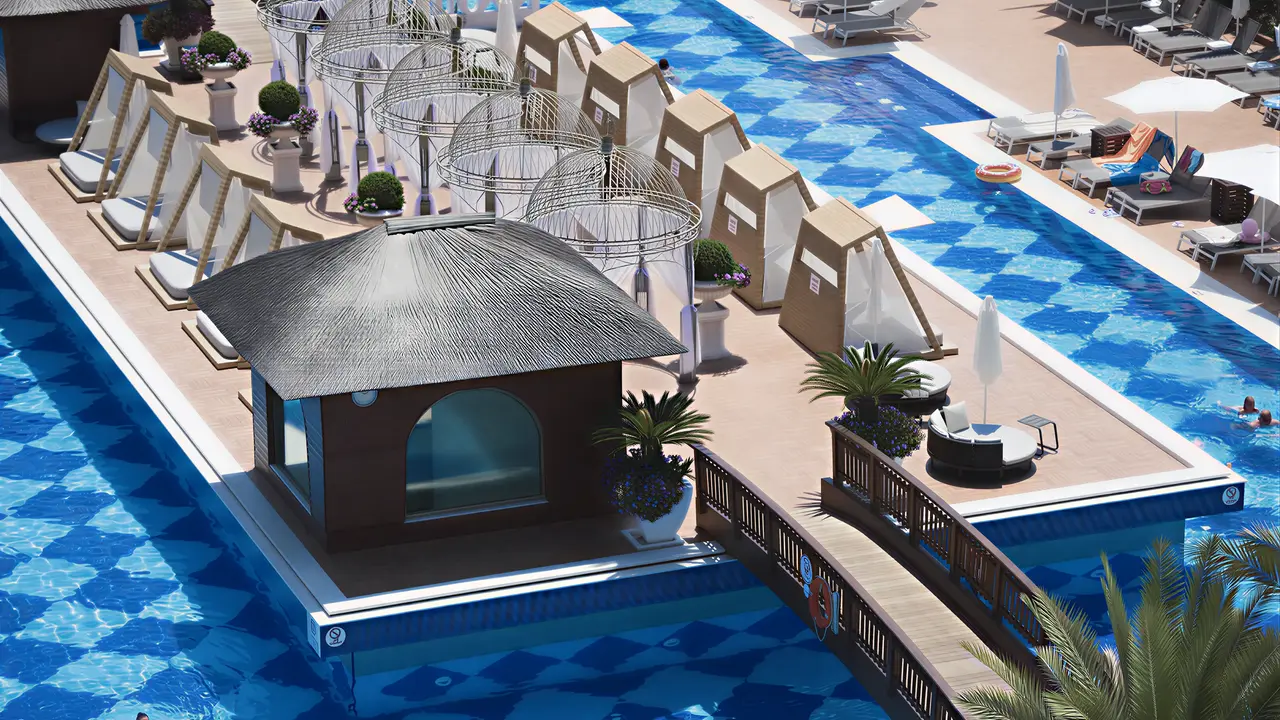 Basen z pawilonami i leżakami w Quattro Beach Spa