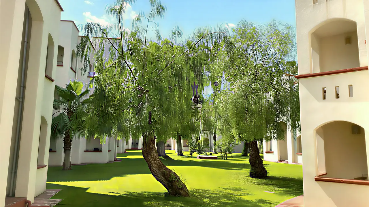 Zielony ogród z drzewami w Queens Park Resort Goynuk