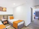 Pokój z łóżkami w Queens Park Resort Goynuk