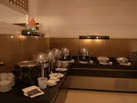 Bufet z jedzeniem w Retac Qunay Dahab Resort & Spa