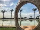 Basen z palmami w hotelu Retac Qunay Dahab Resort & Spa