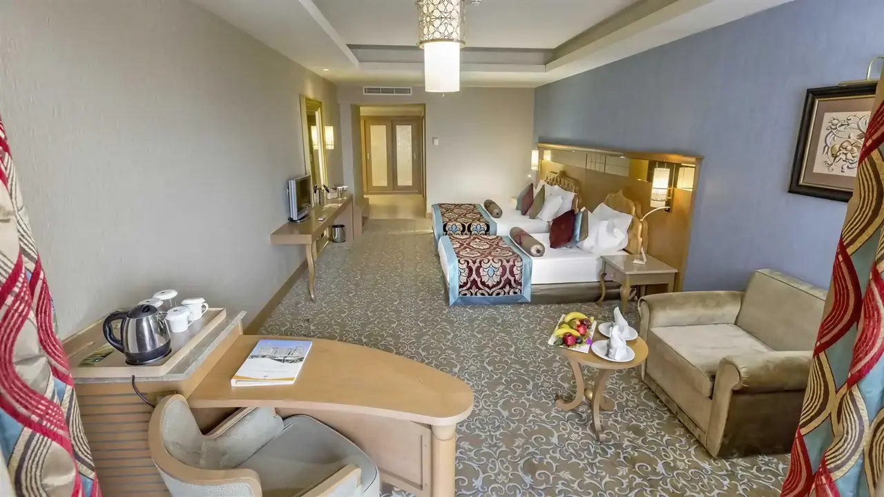 Pokój hotelowy z łóżkami w Royal Holiday Palace
