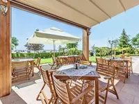 Stolik restauracyjny na tarasie w Sentido Bellevue Beach 