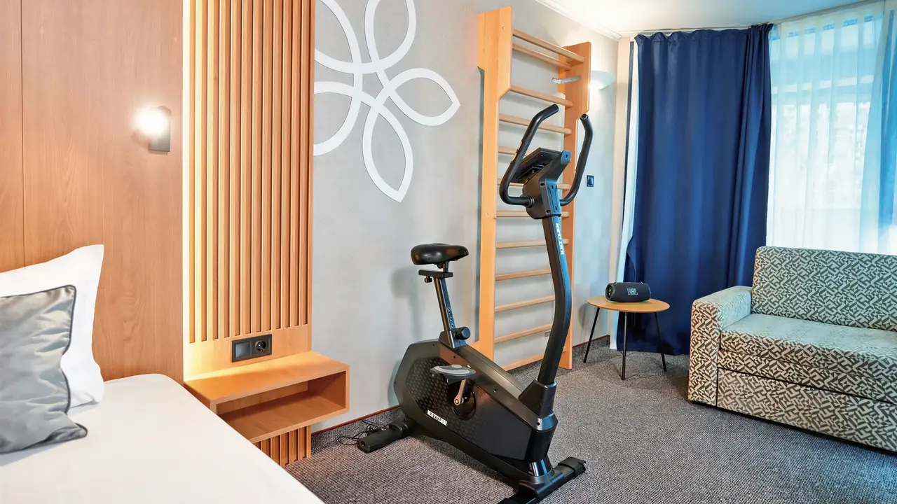 Pokój z rowerkiem stacjonarnym w Sentido Bellevue Beach 