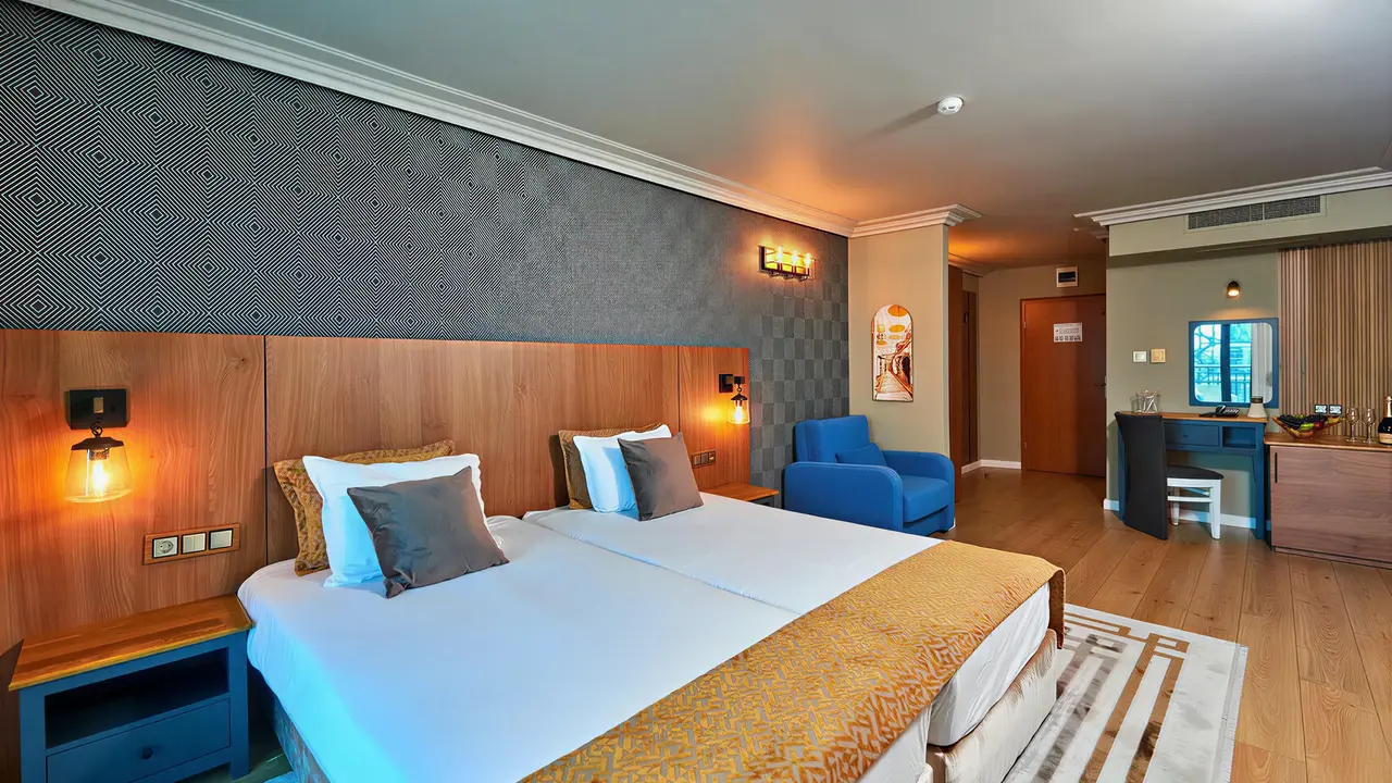Sypialnia z łóżkami w hotelu Sentido Bellevue Beach 
