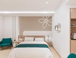 Nowoczesna sypialnia w Sentido Marillia Resort & Spa z wygodnym łóżkiem
